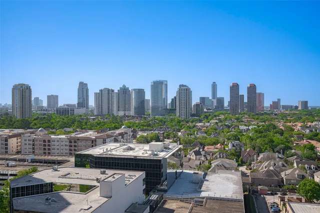 a view of a city with tall buildings