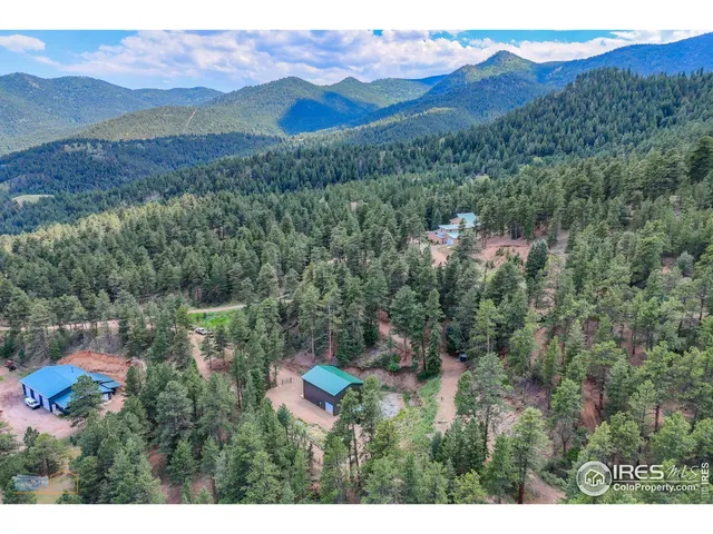 a view of a city with mountain
