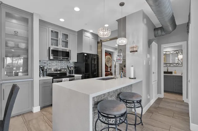 $305,000 | 12800 Melville Drive, Unit B110, Montgomery, TX 77356