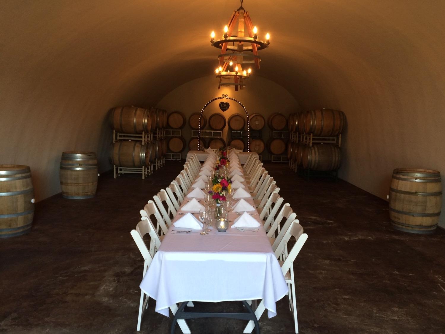 3040 Ponderosa Road Shingle Springs, CA 95682 - Photo 12 of 52 a view of a dining room with furniture and chandelier