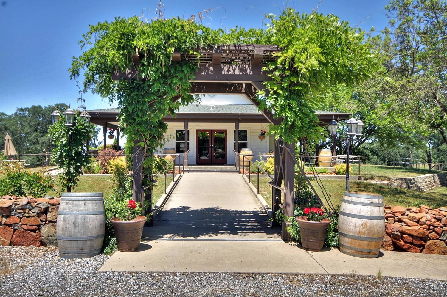 3040 Ponderosa Road Shingle Springs, CA 95682 - Photo 22 of 52 a front view of a house with porch
