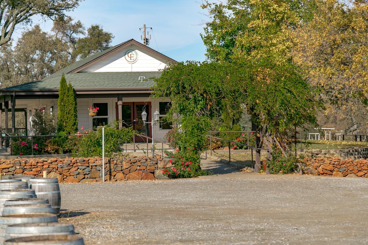 3040 Ponderosa Road Shingle Springs, CA 95682 - Photo 23 of 52 a front view of a house with a yard