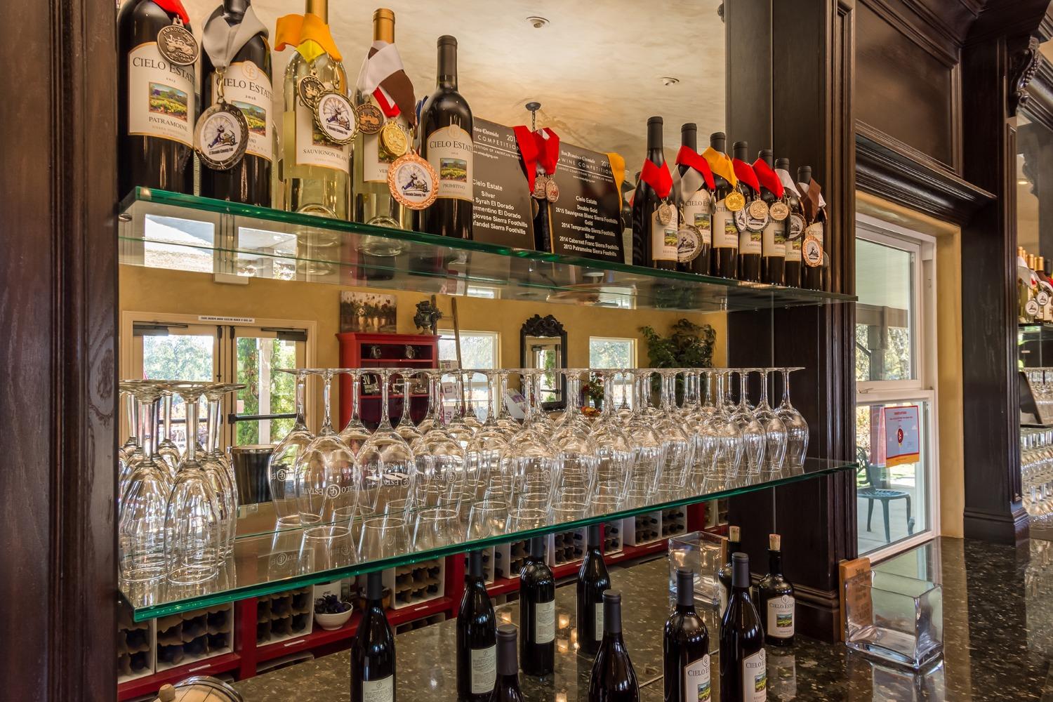 3040 Ponderosa Road Shingle Springs, CA 95682 - Photo 25 of 52 a bunch of bottles sitting on a table