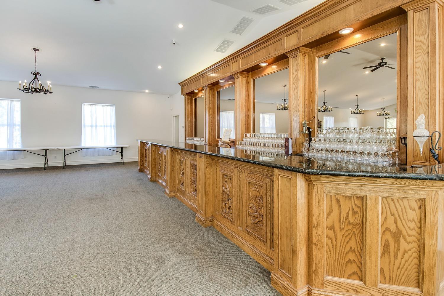3040 Ponderosa Road Shingle Springs, CA 95682 - Photo 38 of 52 a large white kitchen with a large window