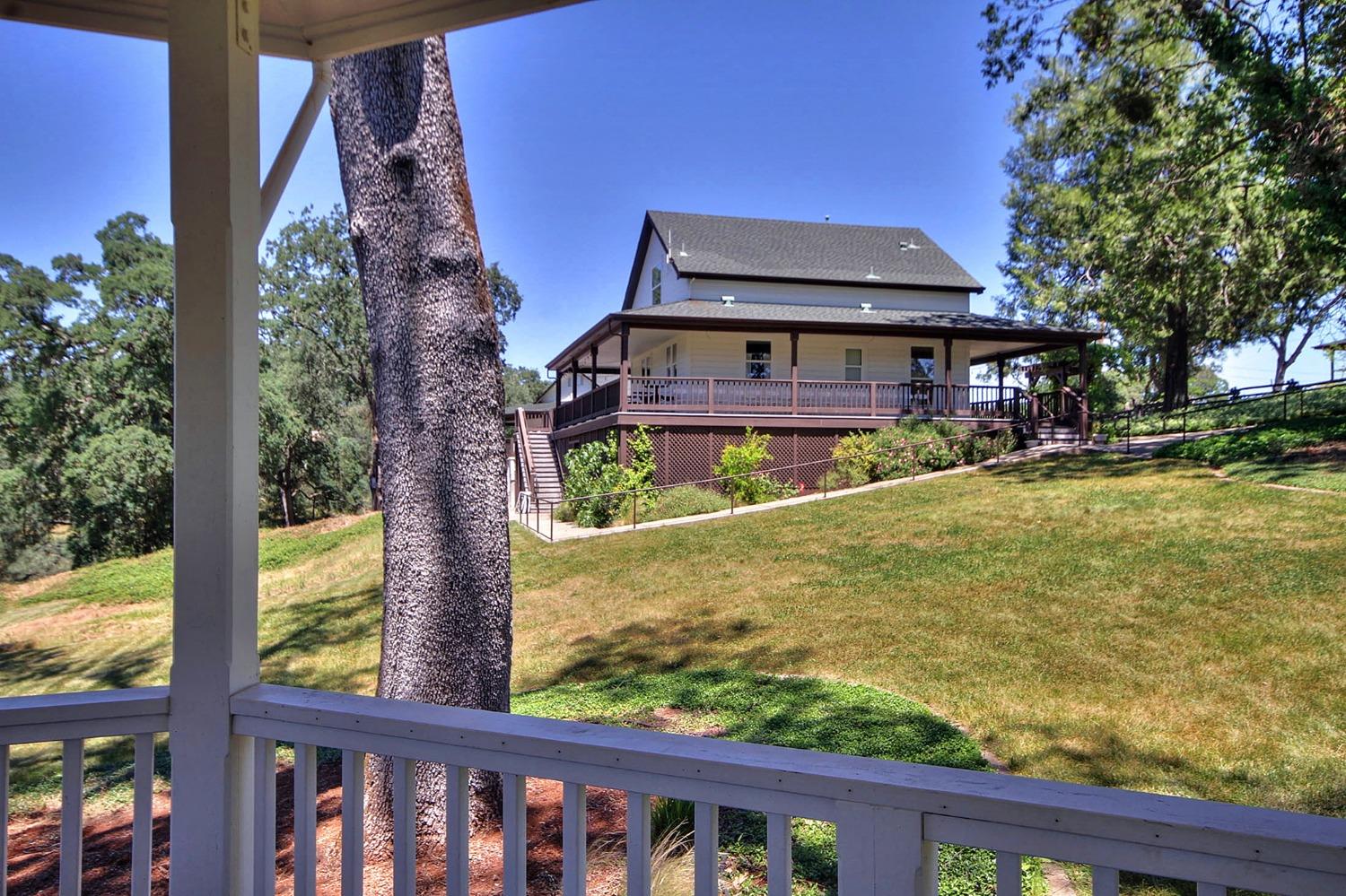 3040 Ponderosa Road Shingle Springs, CA 95682 - Photo 45 of 52 a front view of a house with a yard