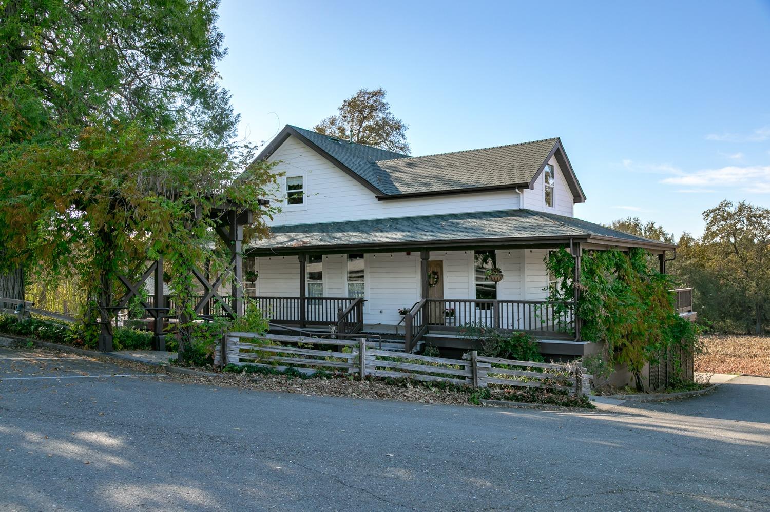 3040 Ponderosa Road Shingle Springs, CA 95682 - Photo 6 of 52 a front view of a house with garage
