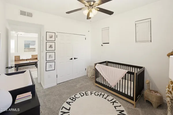 a view of a hallway with staircase
