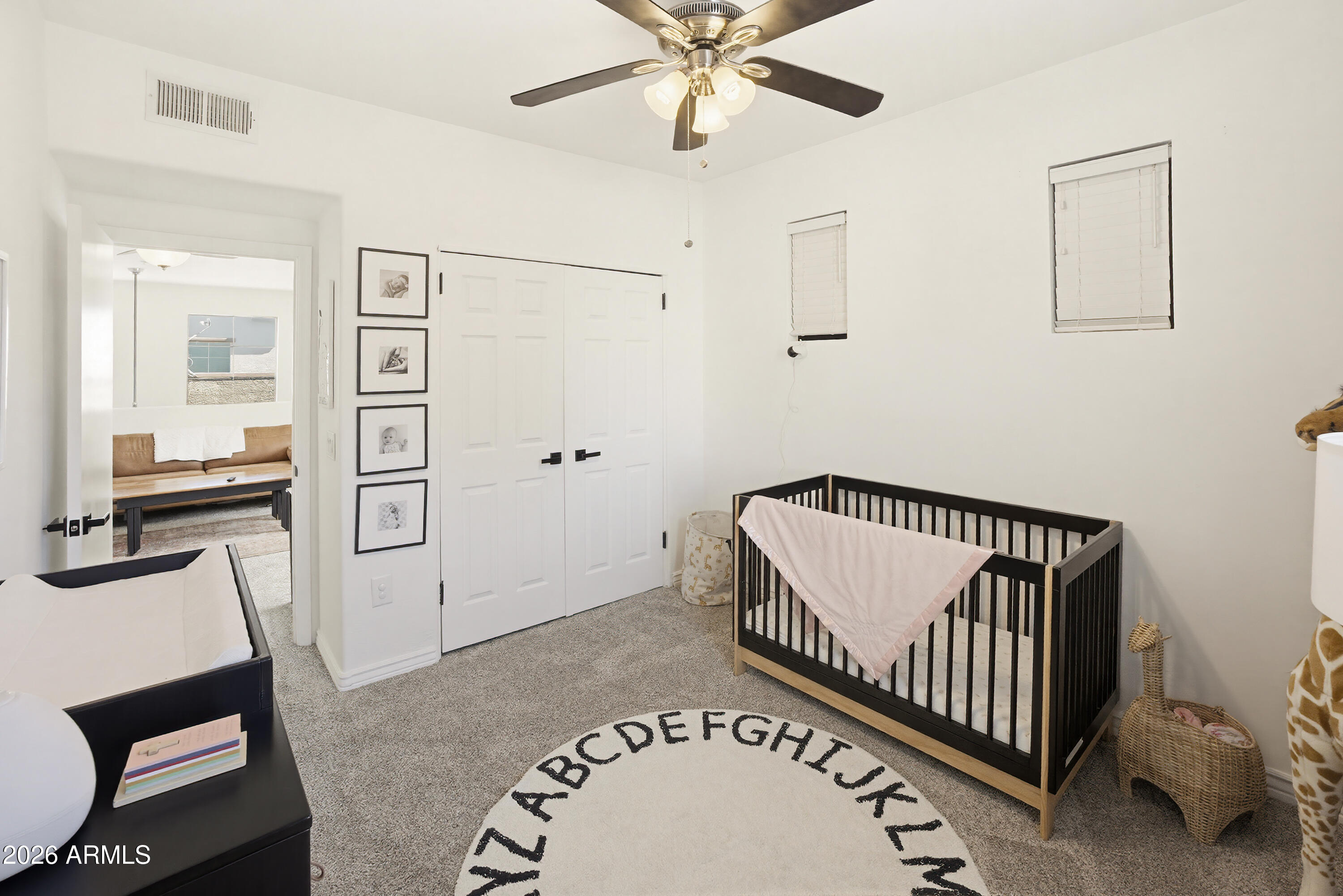 3250 West Greenway Road, Unit 162 Phoenix, AZ 85053 - Photo 21 of 31 a view of a hallway with staircase