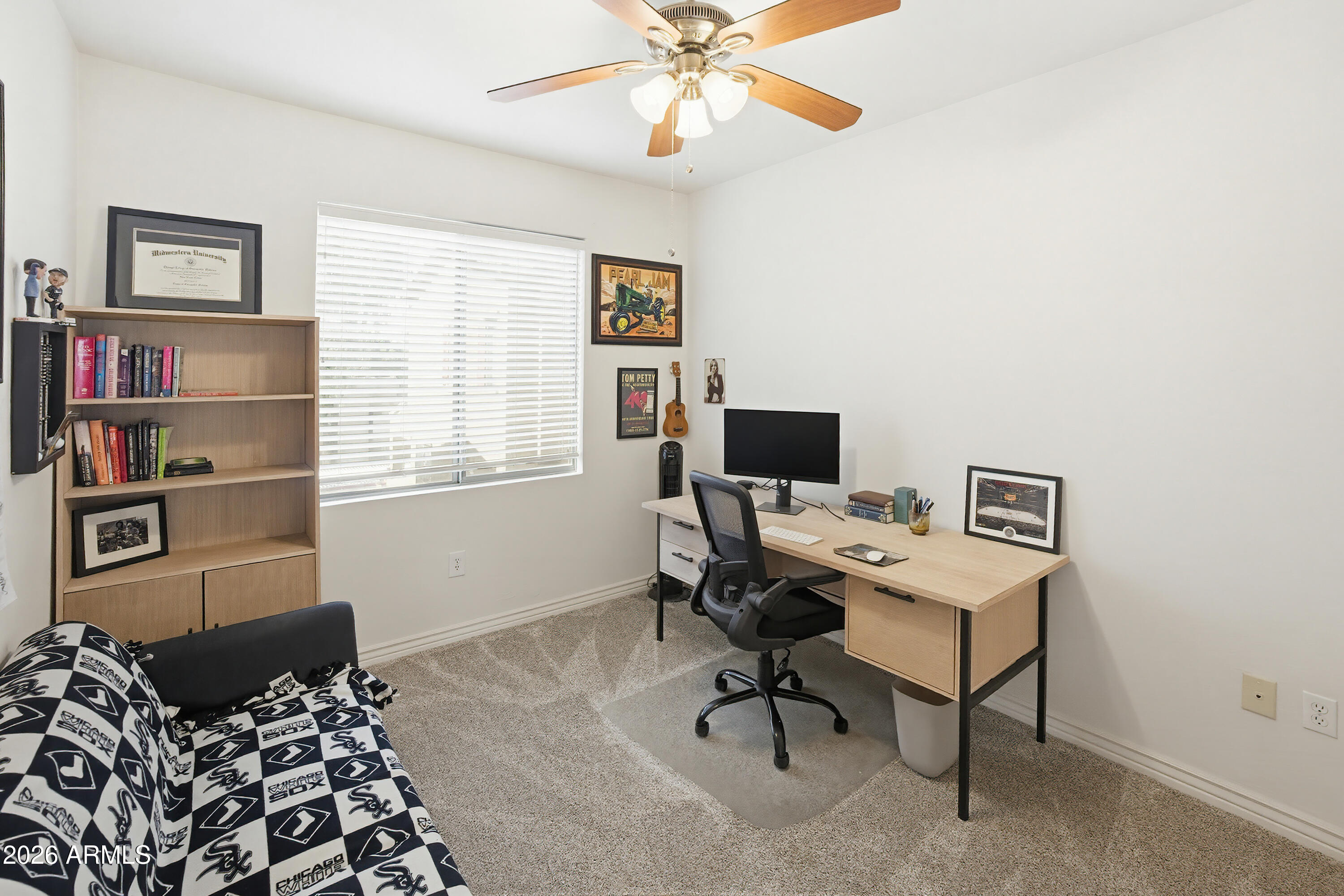 3250 West Greenway Road, Unit 162 Phoenix, AZ 85053 - Photo 22 of 31 a workspace with furniture and a window