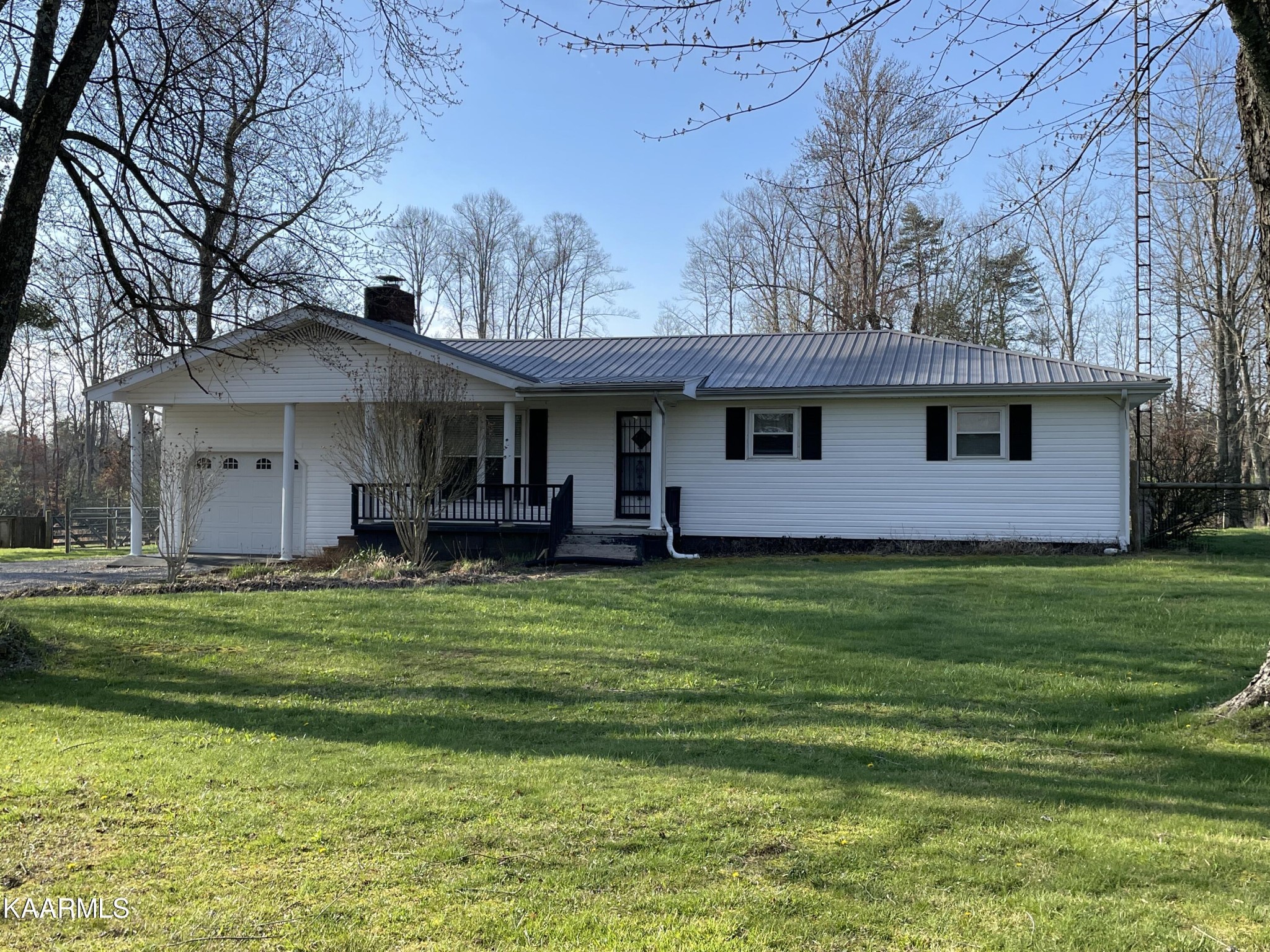 2360 Roslin Road Clarkrange, TN 38553 - Photo 1 of 58 a front view of a house with a garden