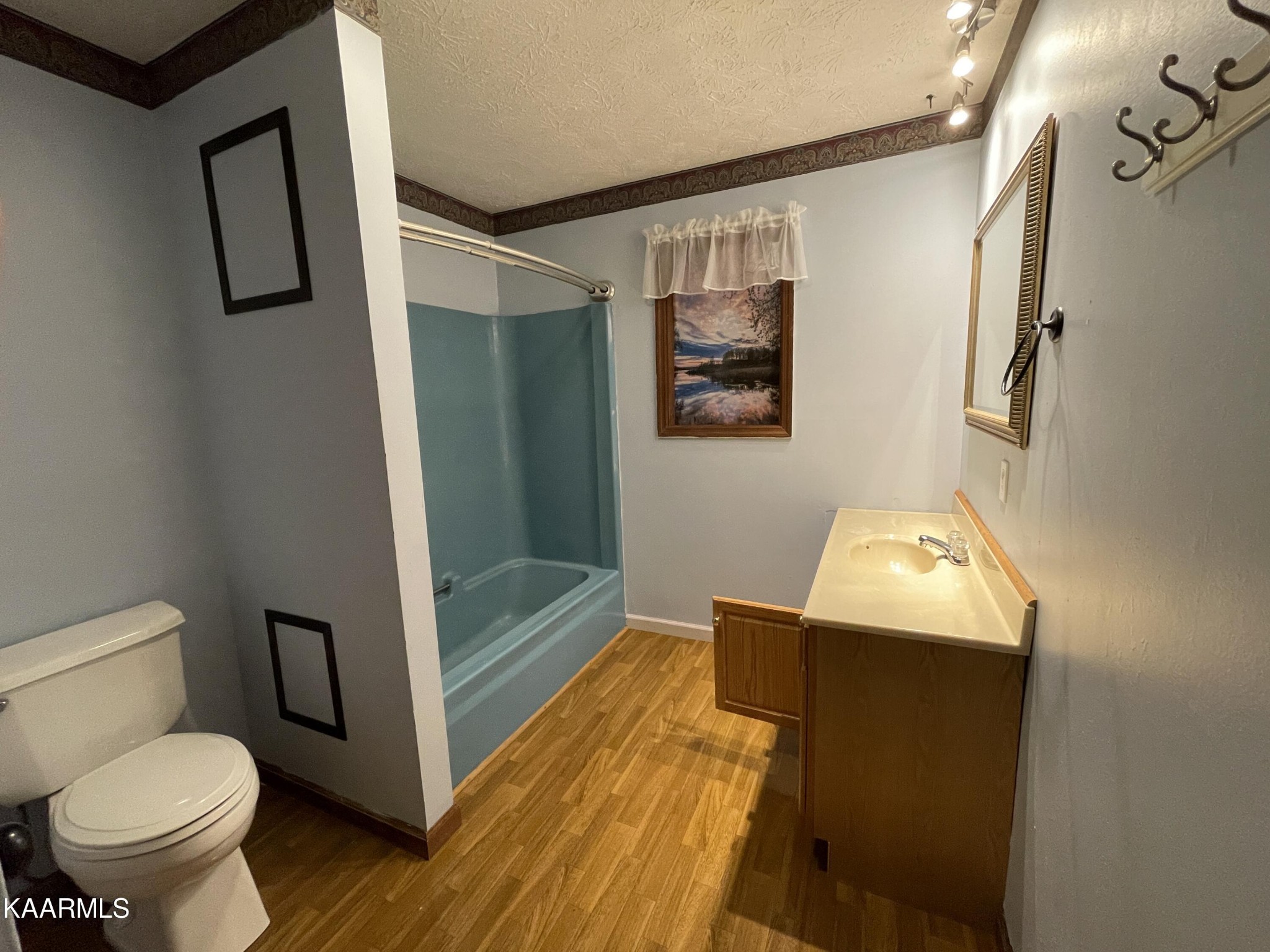 2360 Roslin Road Clarkrange, TN 38553 - Photo 29 of 58 a bathroom with a toilet sink and shower