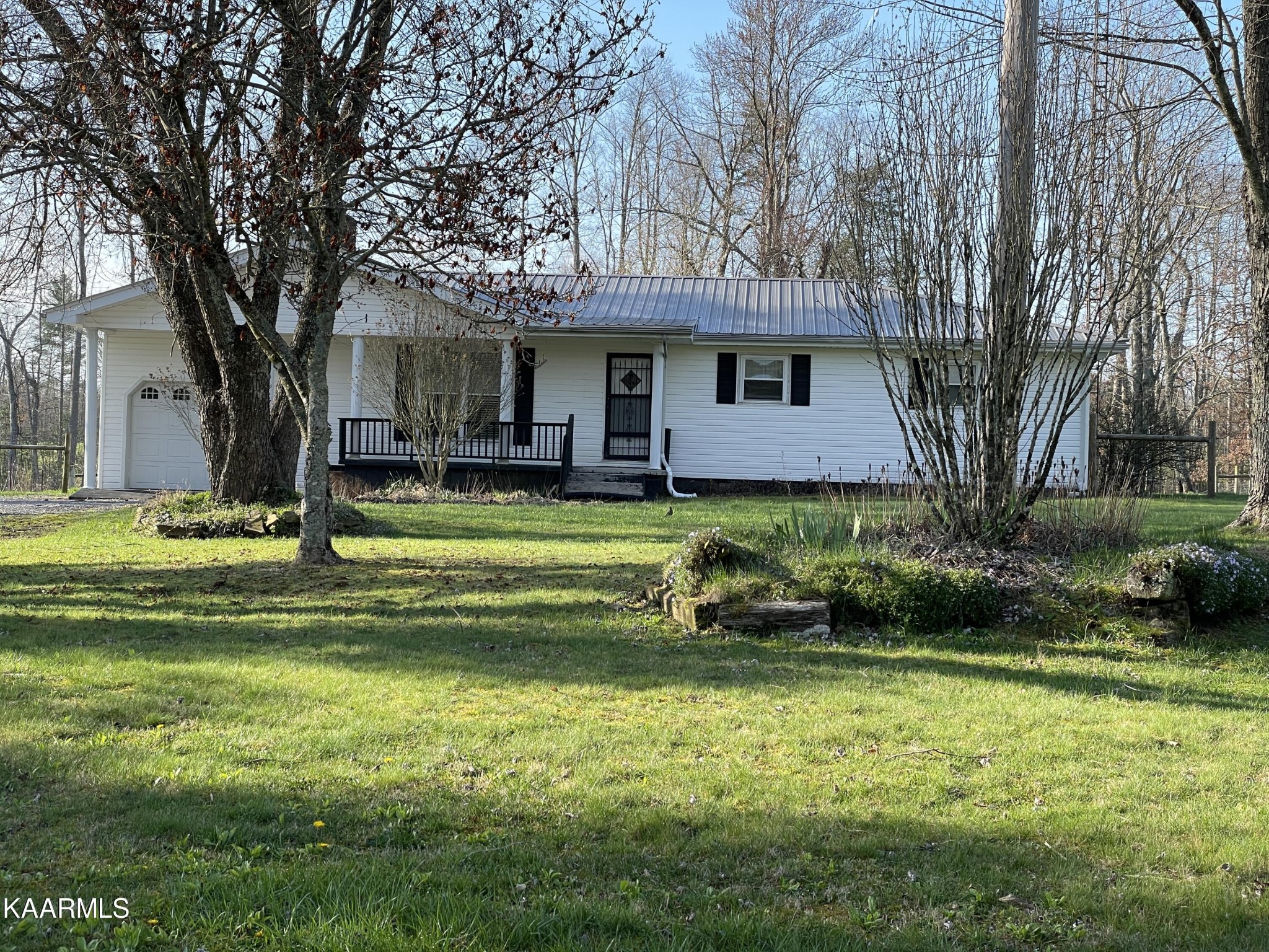 2360 Roslin Road Clarkrange, TN 38553 - Photo 4 of 58 a view of a house with a big yard and large trees