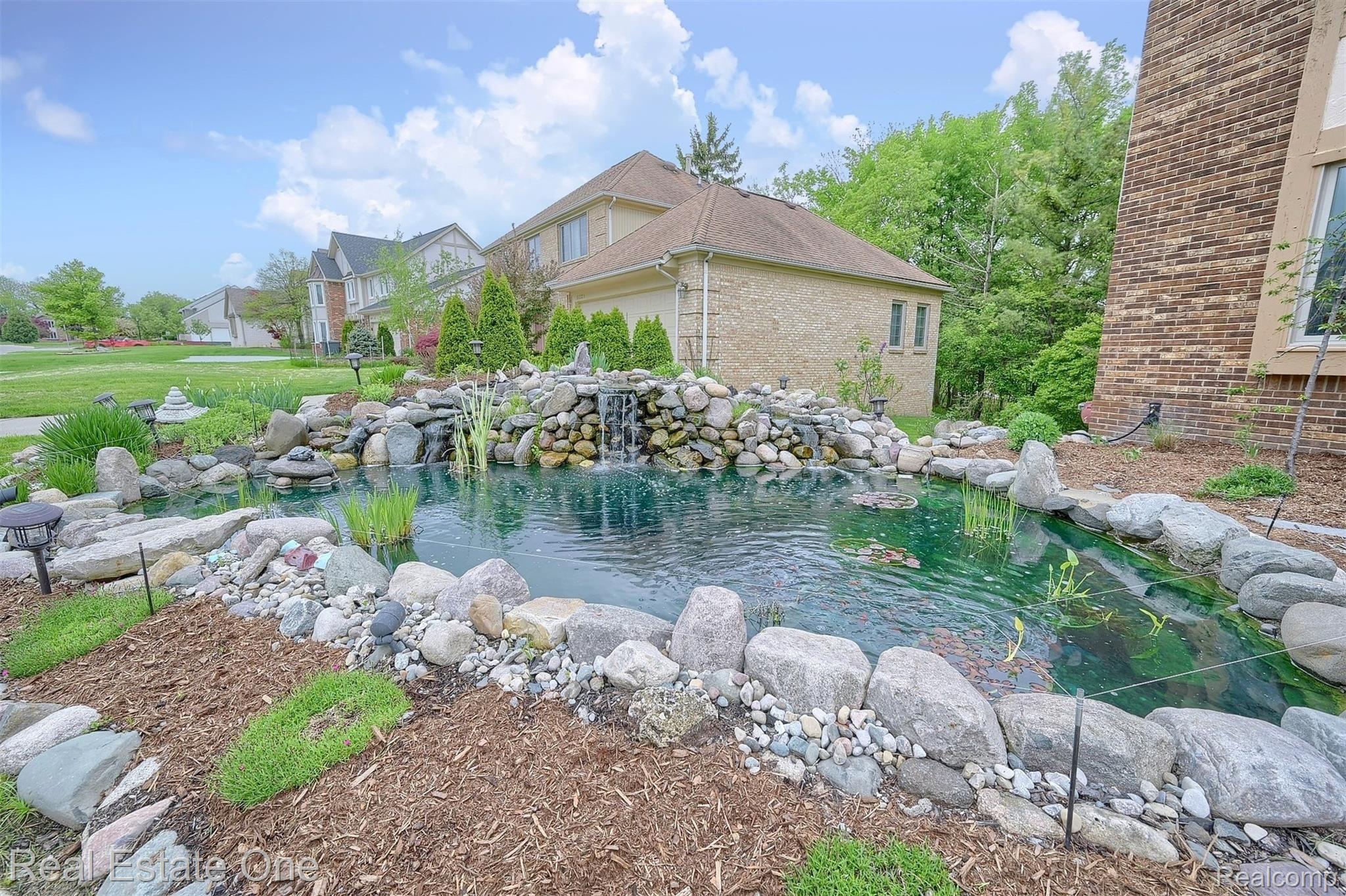31227 Country Ridge Circle Farmington, MI 48331 - Photo 2 of 45 3-Pond.jpg
