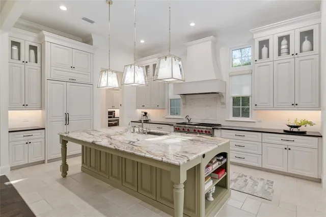 a view of staircase with wooden floor and a potted plant