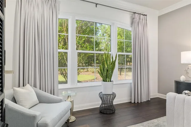 a view of a fountain in front of a house