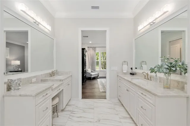 a front view of a house with swing and garden