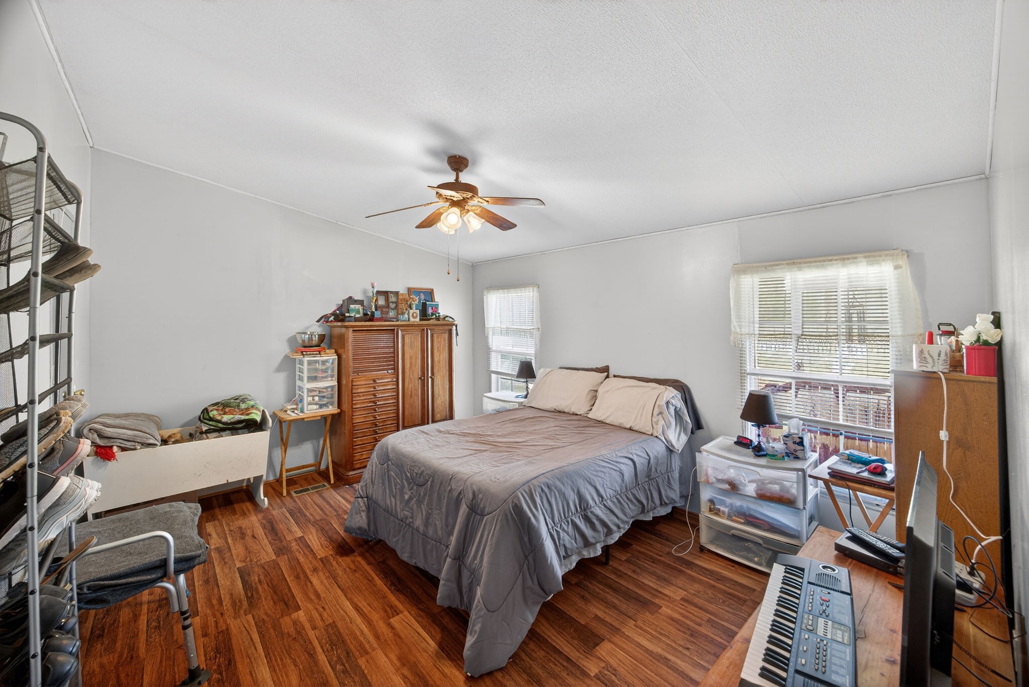 301 Morris Demps Road Sparta, TN 38583 - Photo 11 of 33 a bedroom with a bed and wooden floor