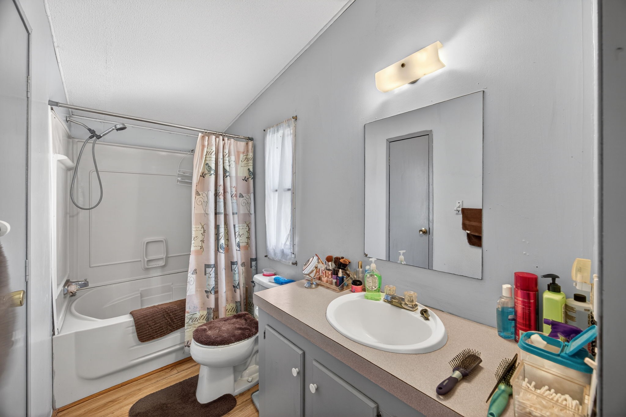 301 Morris Demps Road Sparta, TN 38583 - Photo 12 of 33 a bathroom with a sink a toilet and shower
