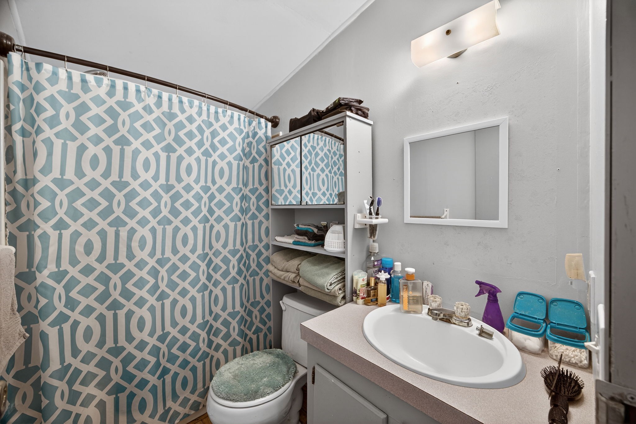 301 Morris Demps Road Sparta, TN 38583 - Photo 15 of 33 a bathroom with a sink toilet and a mirror