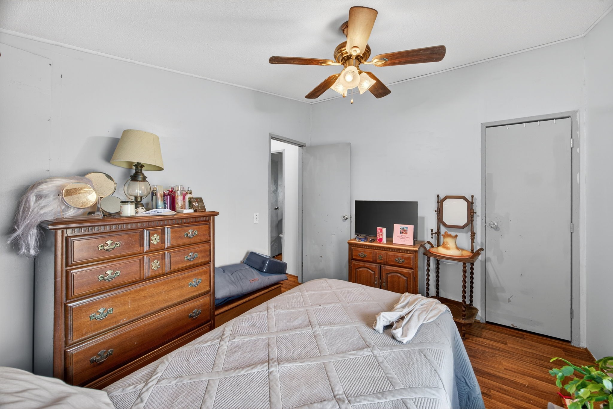 301 Morris Demps Road Sparta, TN 38583 - Photo 17 of 33 a bedroom with a bed and wooden floor