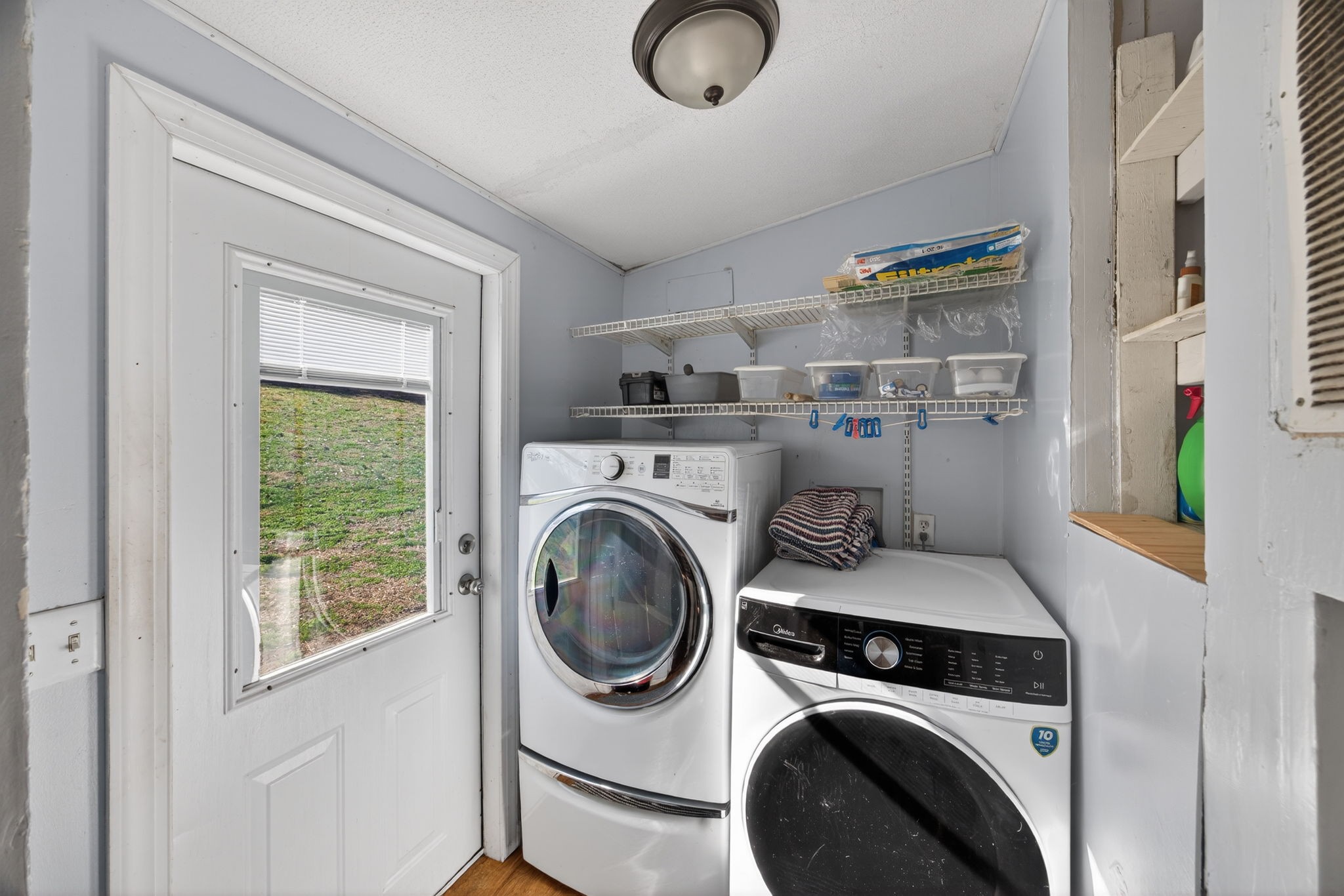 301 Morris Demps Road Sparta, TN 38583 - Photo 18 of 33 a utility room with dryer and washer