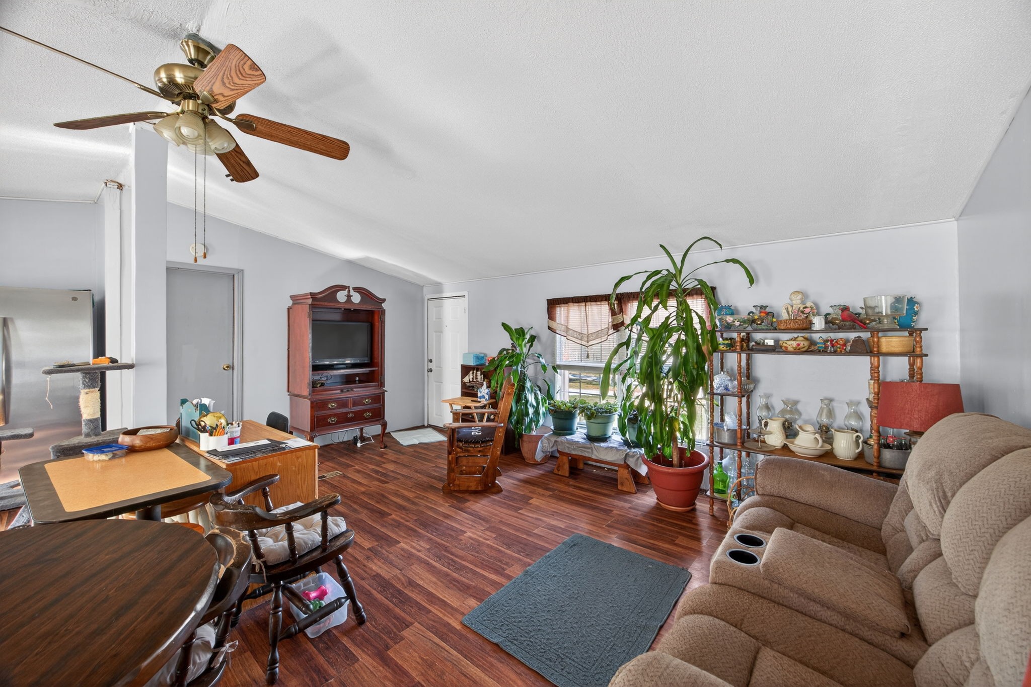 301 Morris Demps Road Sparta, TN 38583 - Photo 3 of 33 a living room with furniture and a floor to ceiling window