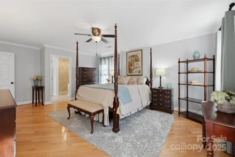 a bed room with a bed and a couch