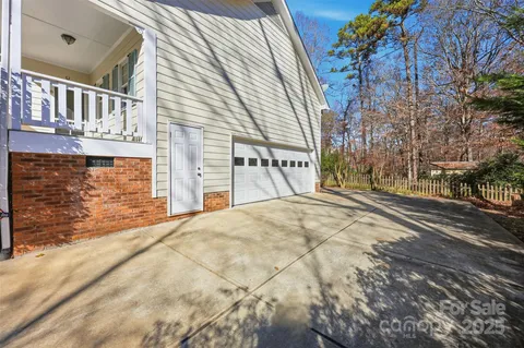 a view of a house with a street