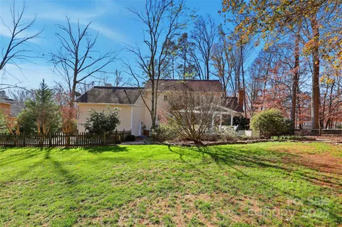 a view of a back yard of the house