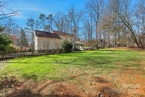 a view of a trees in front of a house