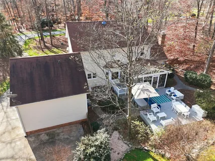 a backyard of a house with lots of green space