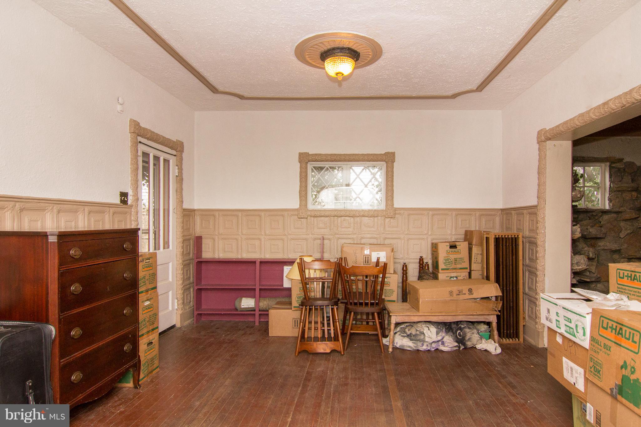 6001 Falls Road Baltimore, MD 21209 - Photo 22 of 30 a view of living room with furniture and wooden floor
