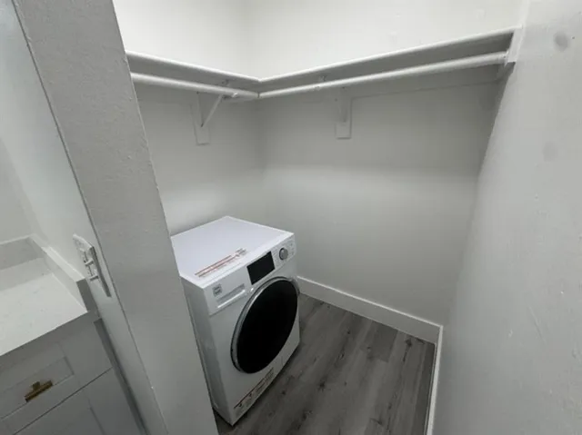 a utility room with dryer and washer