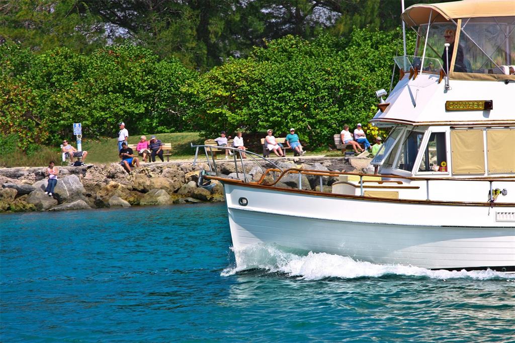 400 Base, Unit 225 Venice, FL 34285 - Photo 15 of 20 a view of a lake with a sitting area