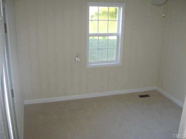 801 Colleton Road Raleigh, NC 27610 - Photo 7 of 12 an empty room with a window