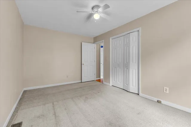a bathroom with a sink toilet and mirror