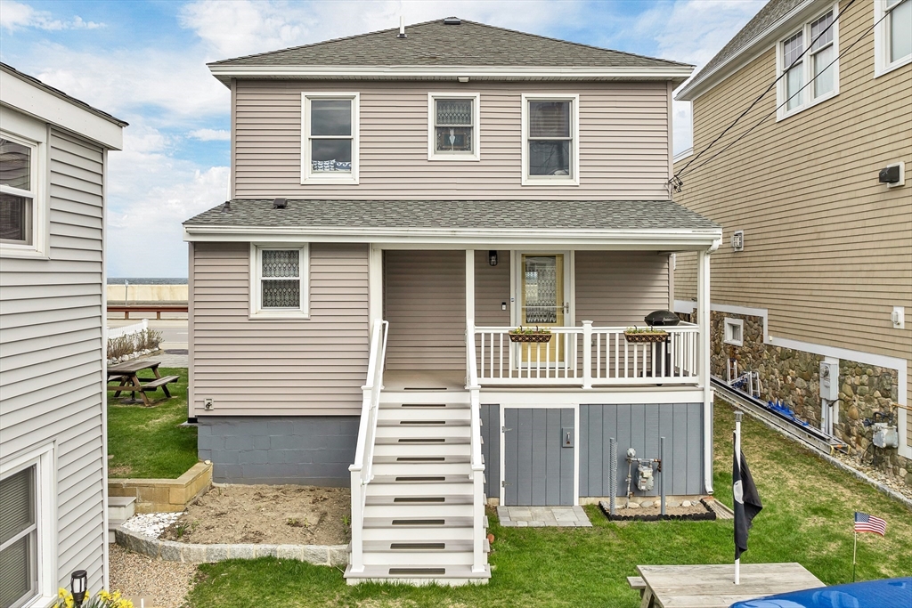 713 Ocean Boulevard Hampton, NH 03842 - Photo 3 of 42 a front view of a house with a yard