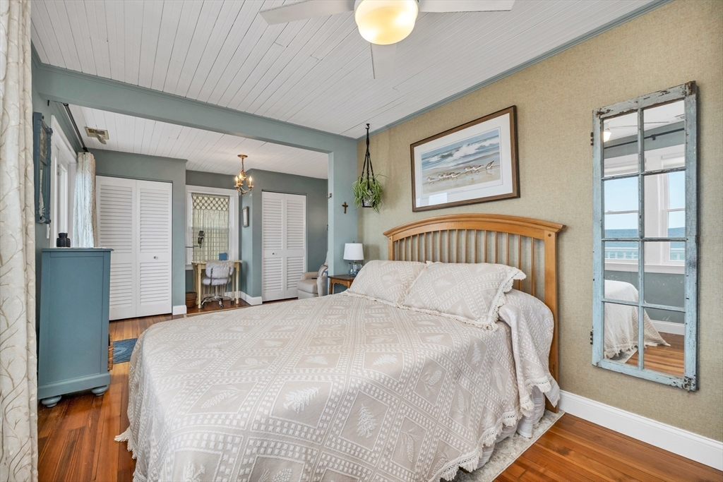 713 Ocean Boulevard Hampton, NH 03842 - Photo 33 of 42 a bedroom with bed and a window