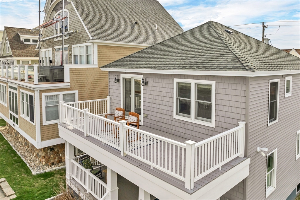 713 Ocean Boulevard Hampton, NH 03842 - Photo 6 of 42 a front view of a house with a porch