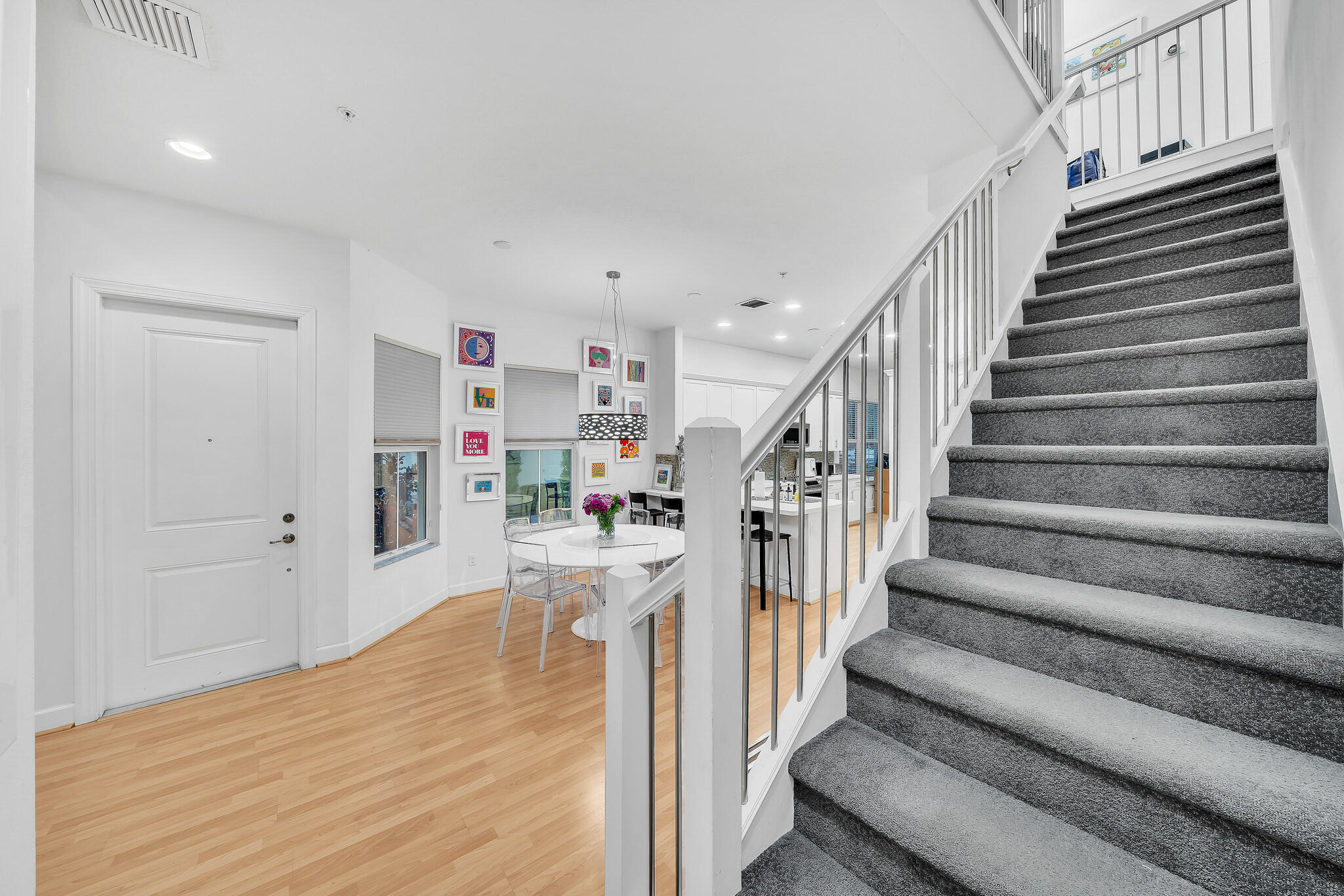 23008 Clear Echo Drive, Unit 11 Boca Raton, FL 33433 - Photo 10 of 64 a view of entryway and hall with wooden floor