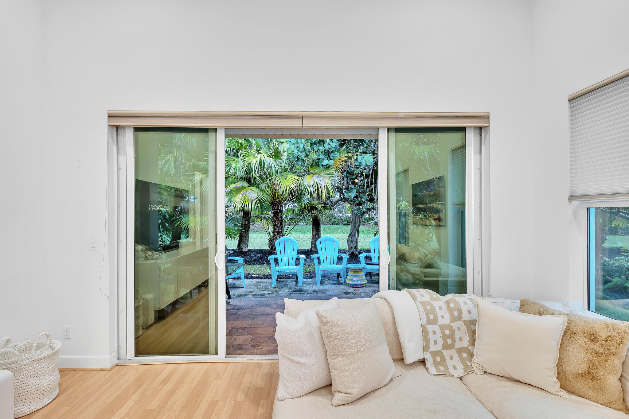 23008 Clear Echo Drive, Unit 11 Boca Raton, FL 33433 - Photo 27 of 64 a living room with furniture and a large window