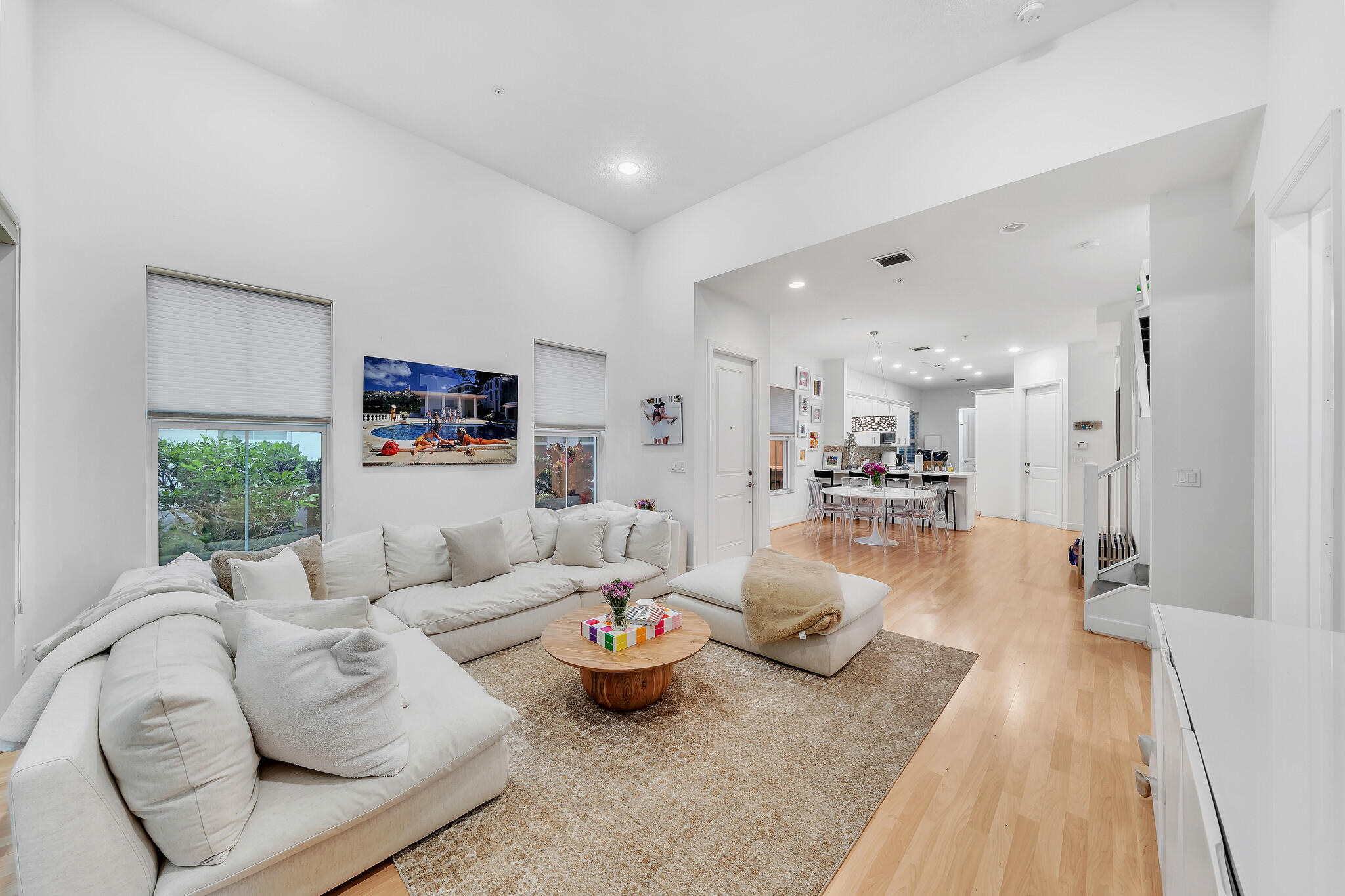23008 Clear Echo Drive, Unit 11 Boca Raton, FL 33433 - Photo 30 of 64 a living room with furniture and a wooden floor