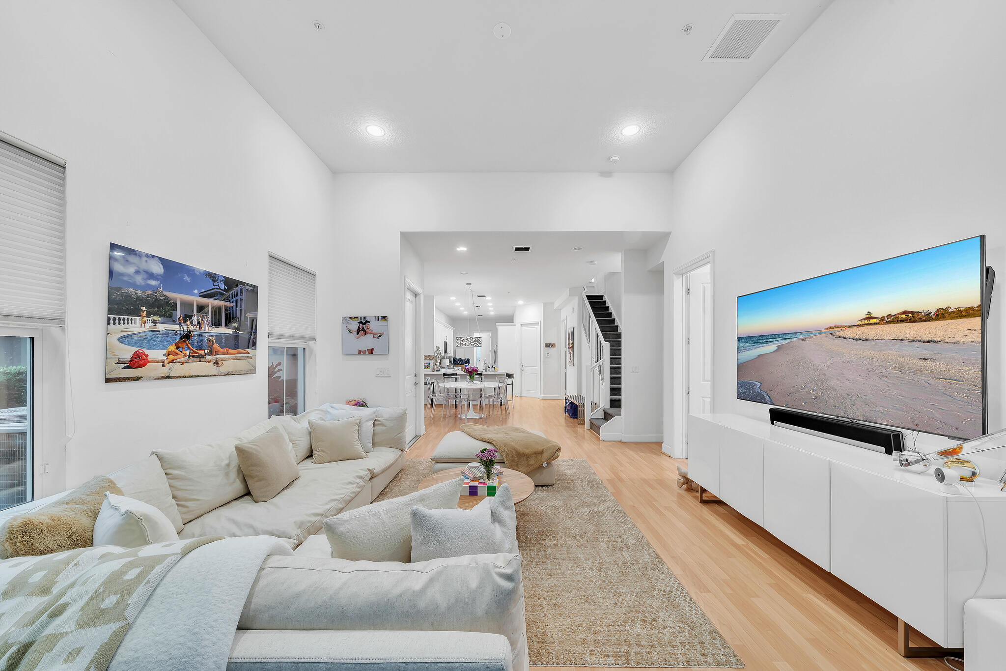 23008 Clear Echo Drive, Unit 11 Boca Raton, FL 33433 - Photo 31 of 64 a living room with furniture and a flat screen tv