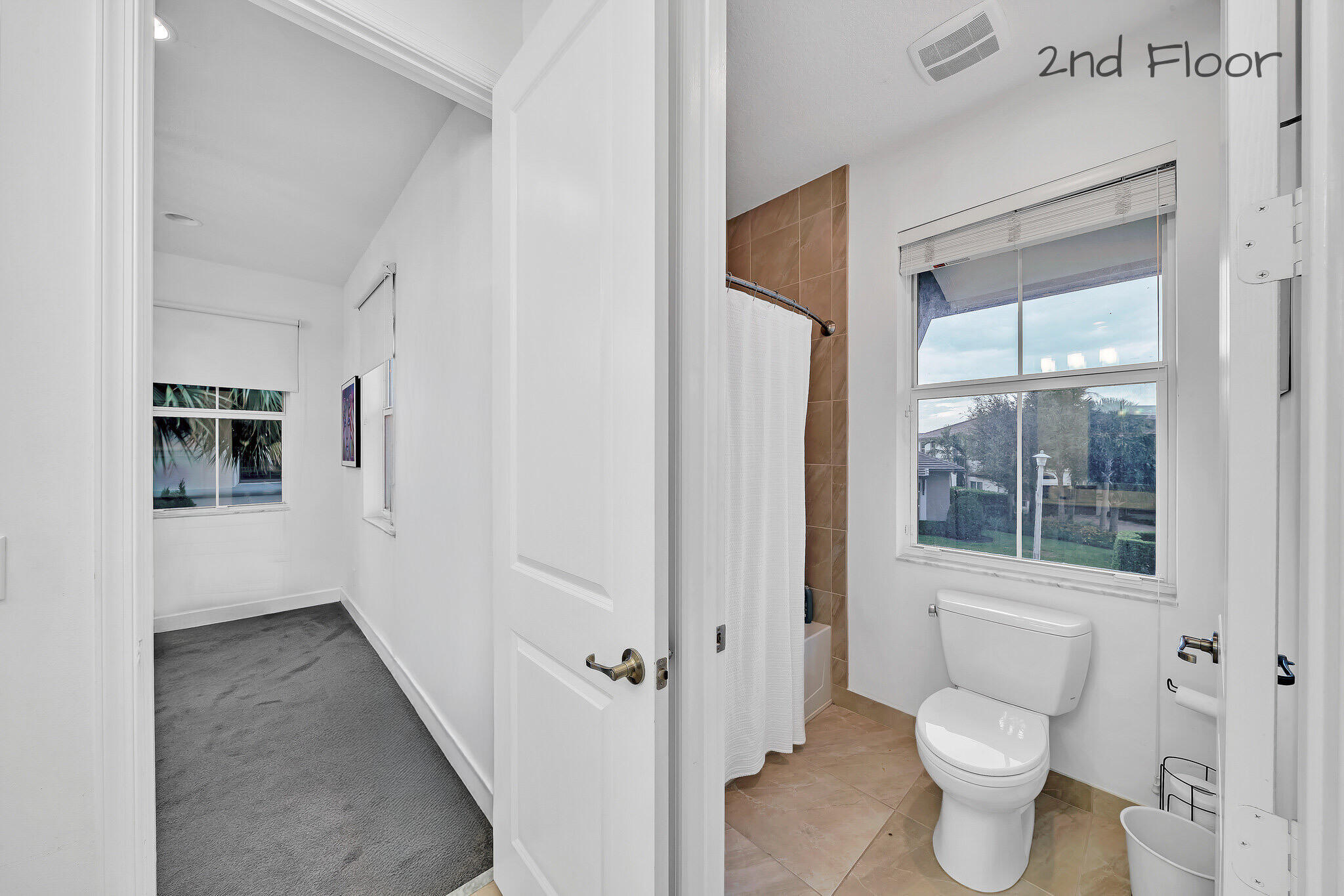 23008 Clear Echo Drive, Unit 11 Boca Raton, FL 33433 - Photo 54 of 64 a bathroom with a toilet and a shower