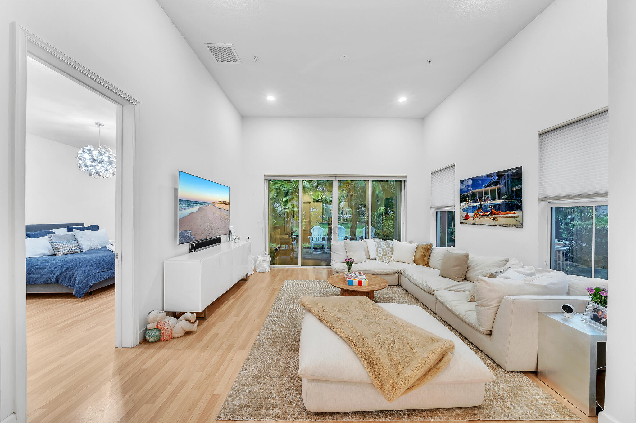 23008 Clear Echo Drive, Unit 11 Boca Raton, FL 33433 - Photo 7 of 64 a living room with furniture and a large window