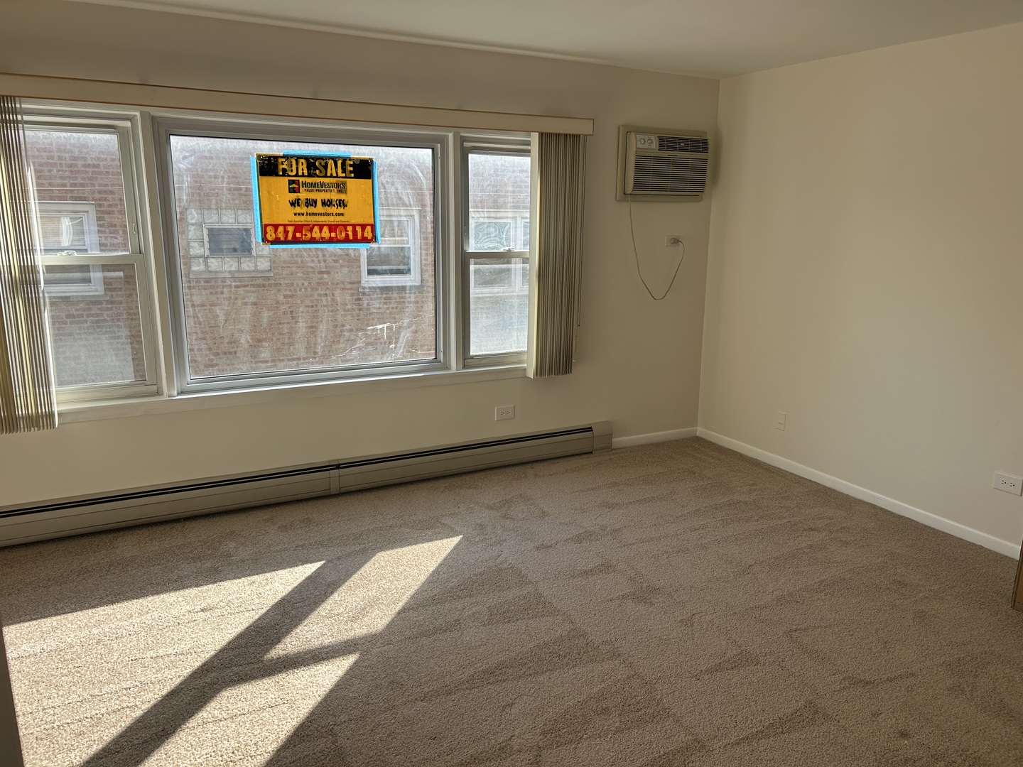 3820 West 47th Street, Unit 2NE Chicago, IL 60632 - Photo 6 of 6 an empty room with windows and entrance