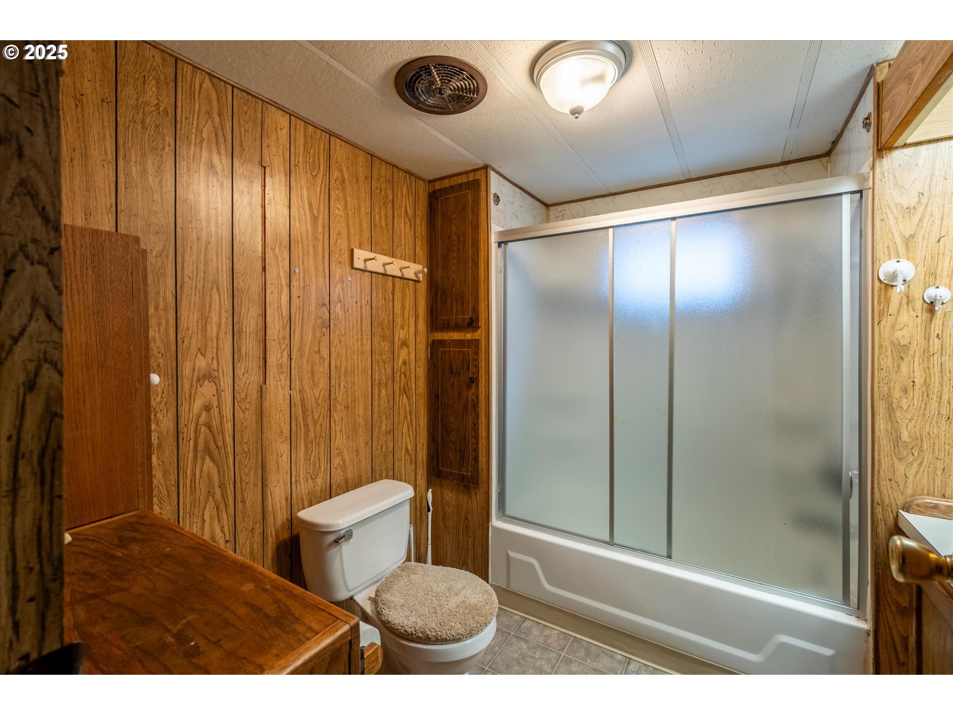 125 North 4th Street Lakeside, OR 97449 - Photo 20 of 38 a bathroom with a sink and a toilet
