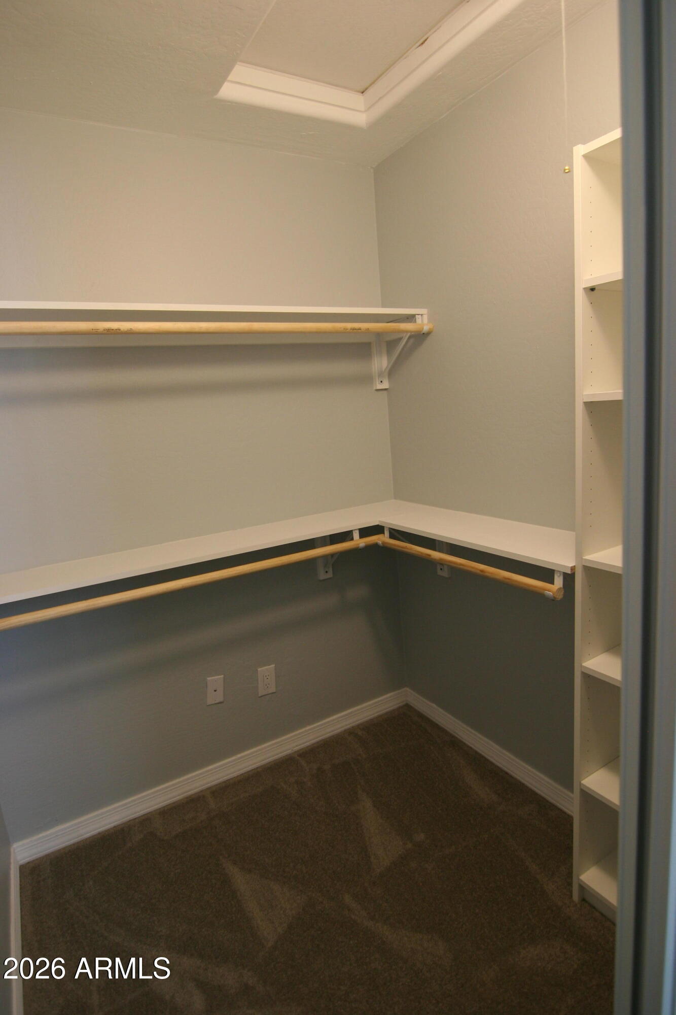 18487 West Ipswitch Way Surprise, AZ 85374 - Photo 15 of 36 a view of small space with racks on the wall