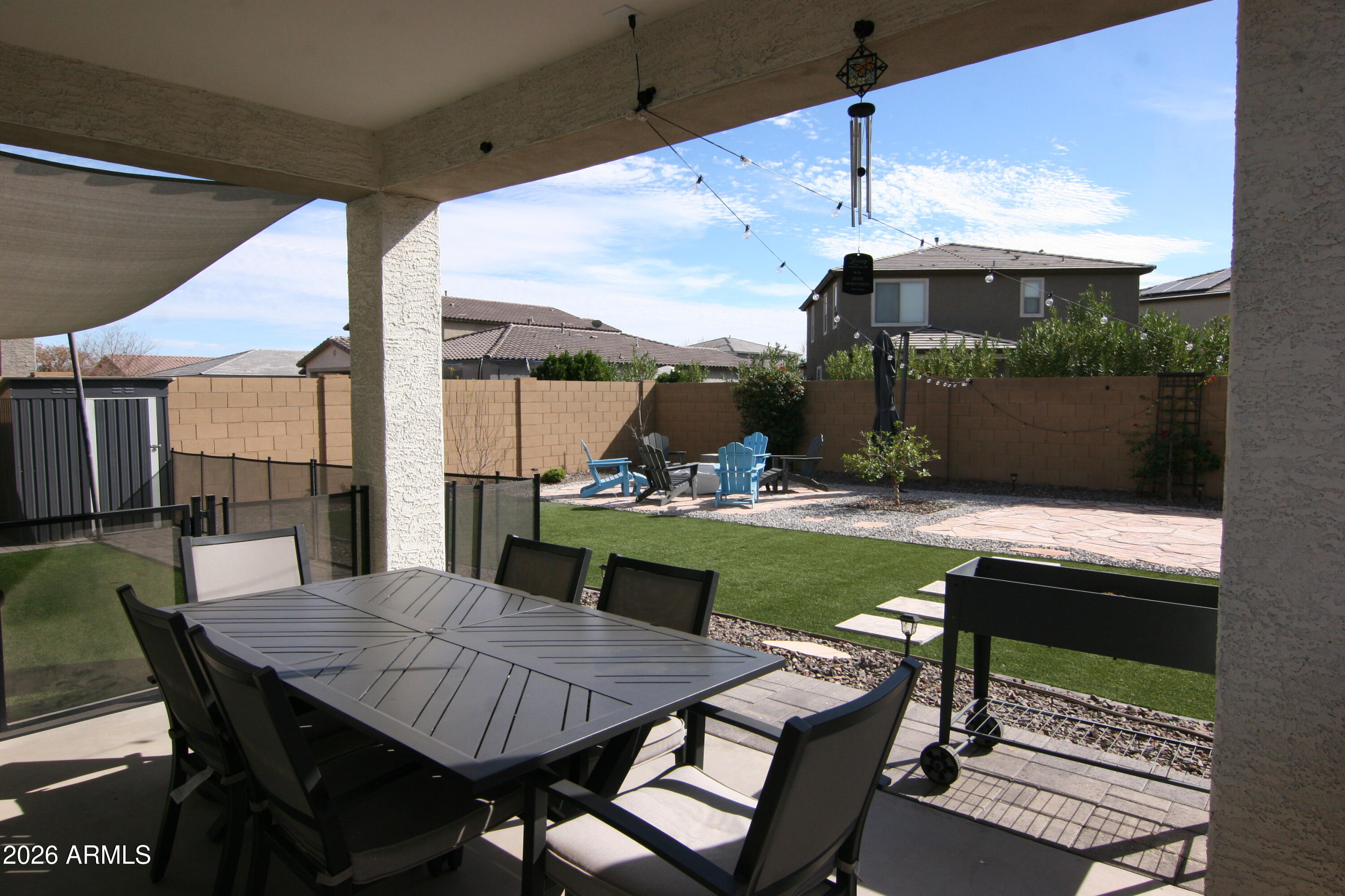 18487 West Ipswitch Way Surprise, AZ 85374 - Photo 22 of 36 a patio with table and chairs