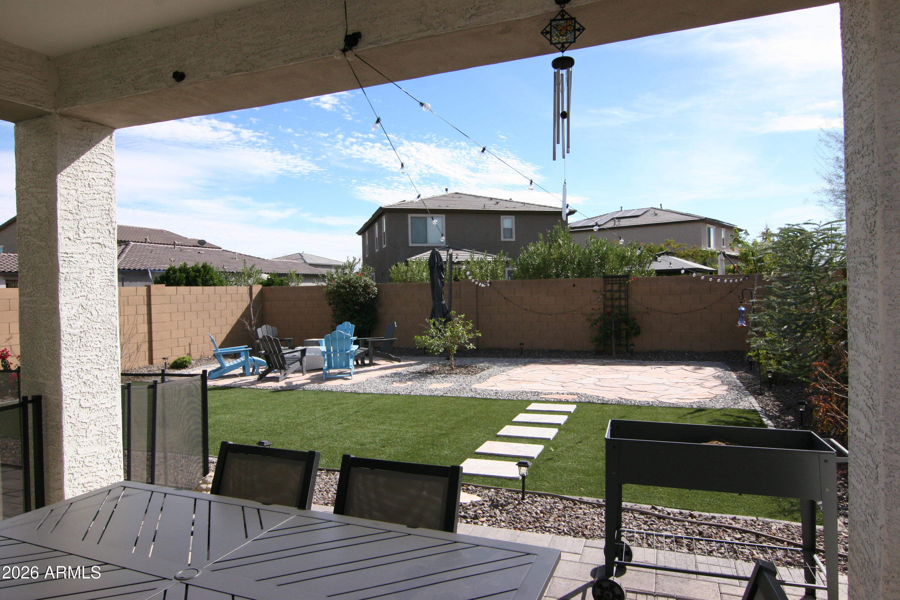 18487 West Ipswitch Way Surprise, AZ 85374 - Photo 23 of 36 a view of a terrace with furniture
